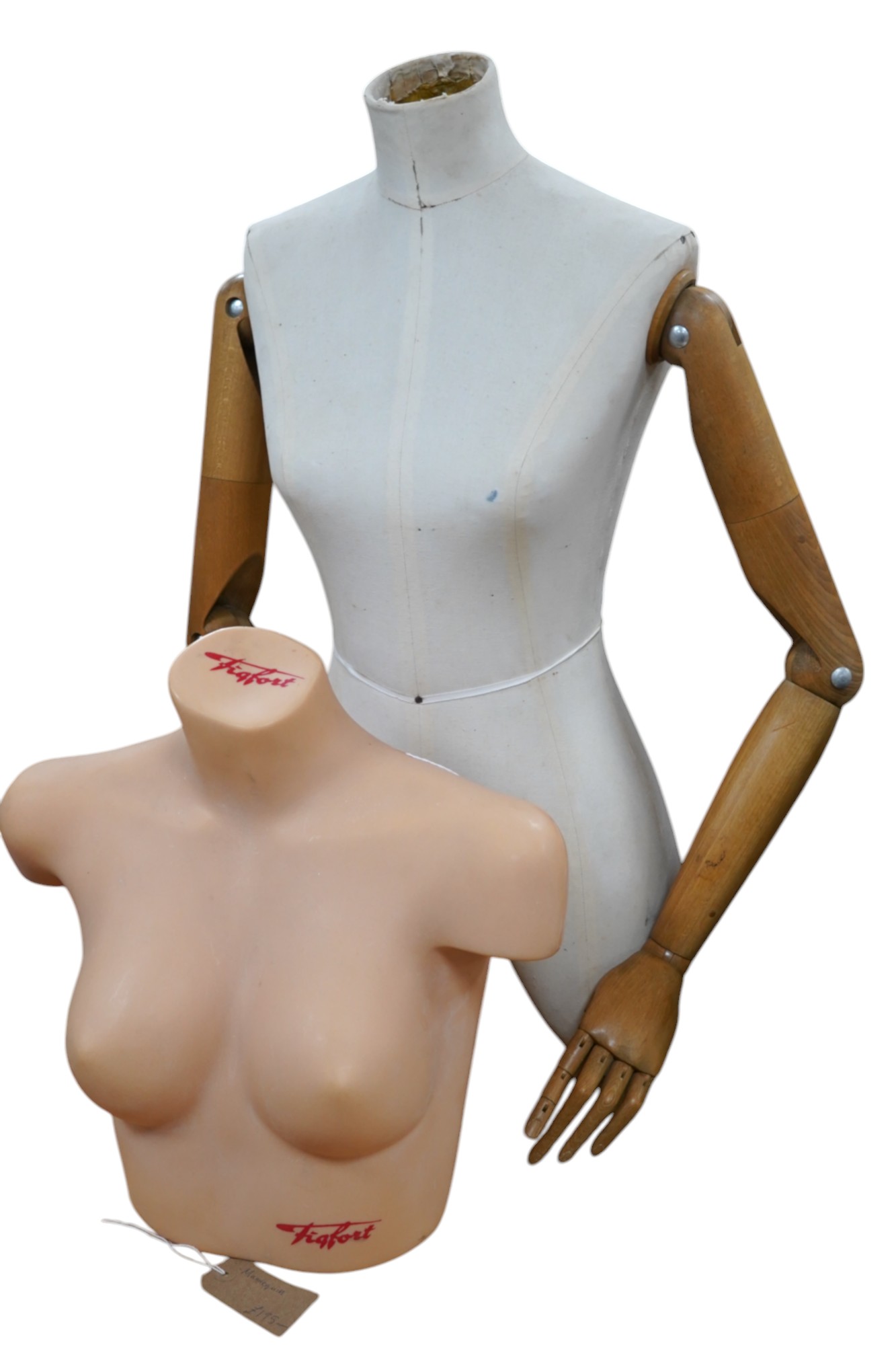 An unusual half female mannequin (cloth covered) with carved wooden jointed arms, hands and fingers, together with a female bust, by Figfort, mannequin 72 cm high. Condition - both good